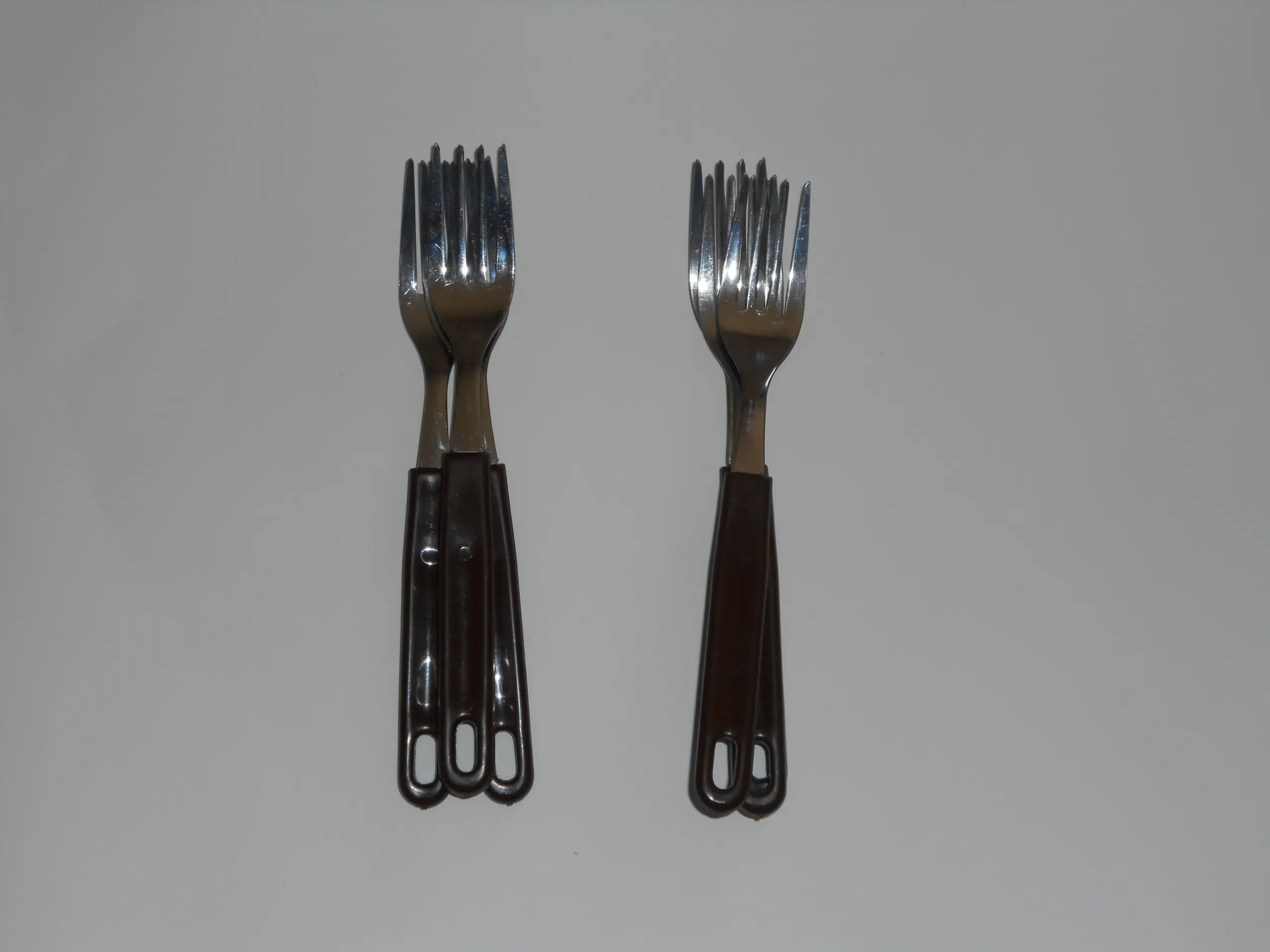 Forchetta da tavola vintage con manico in plastica
